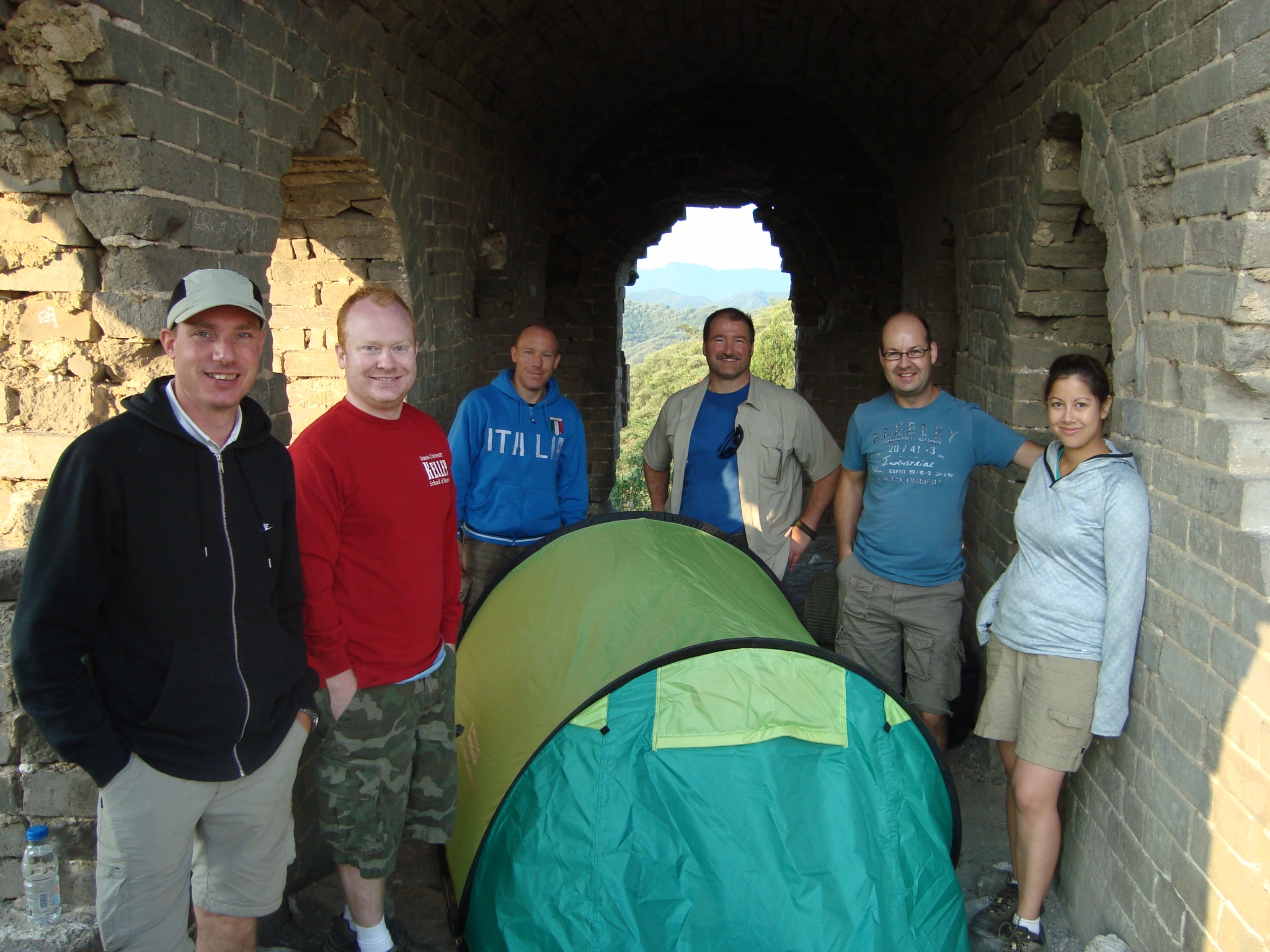 Travelers camping inside an ancient Great Wall watchtower
